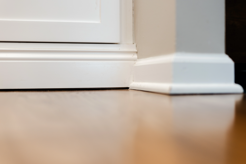 The baseboards have separated from the floor